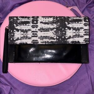 Sondra Roberts Black and White Textured Zip-Front Clutch